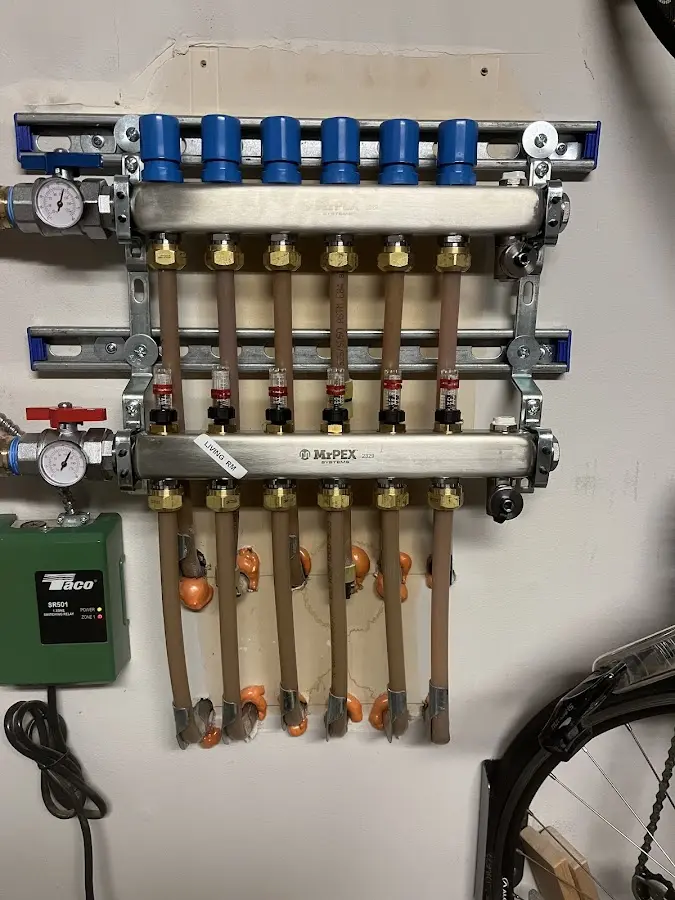 Plumber performing Water Heater Repair at a residential property in Travelers Rest